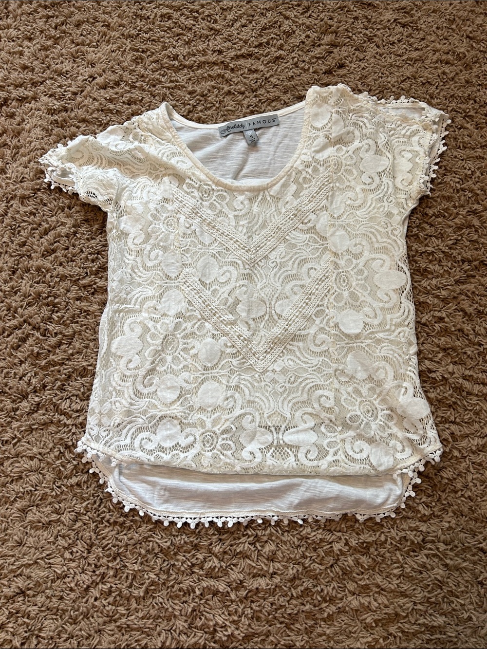 Absolutely famous ivory cold shoulder top size small
